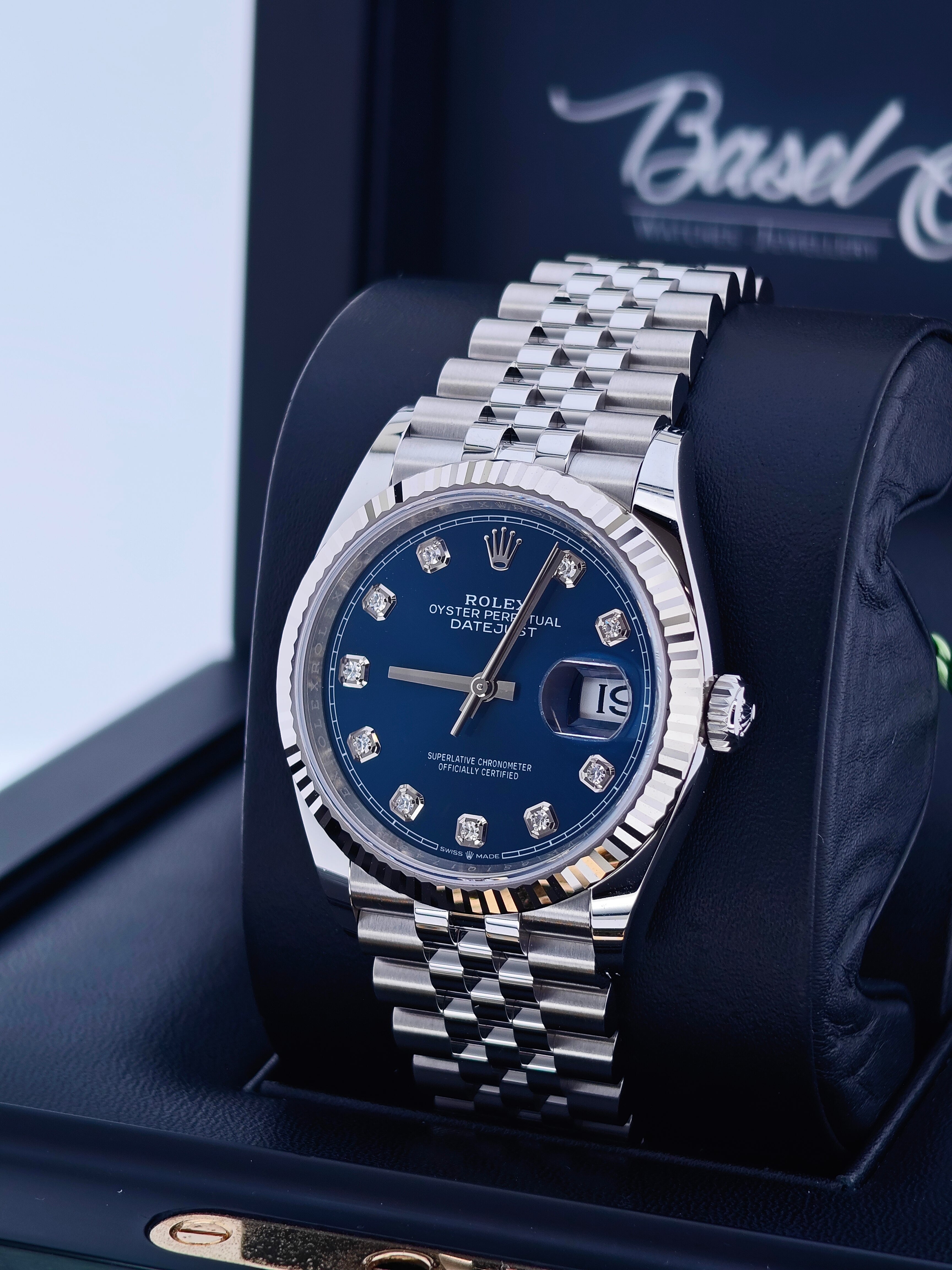 Rolex Silver Blue Stainless Steel Watch